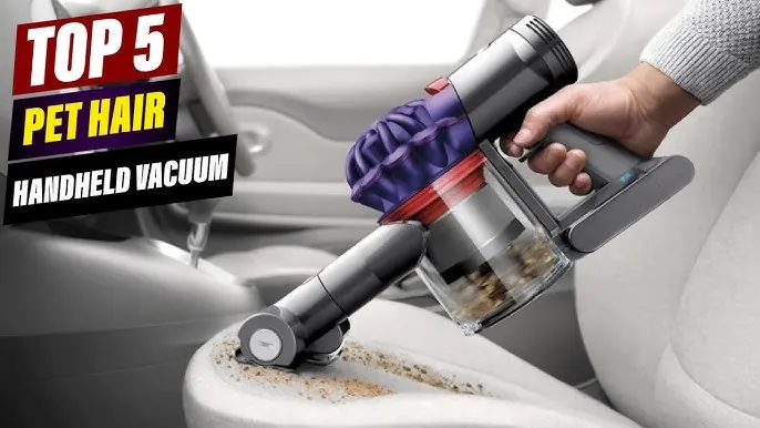 Motorized pet attachment cleaning embedded fur from car upholstery.