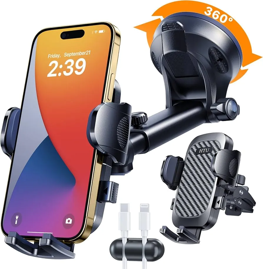 A smartphone in a car phone holder safely positioned below the driving sightline.