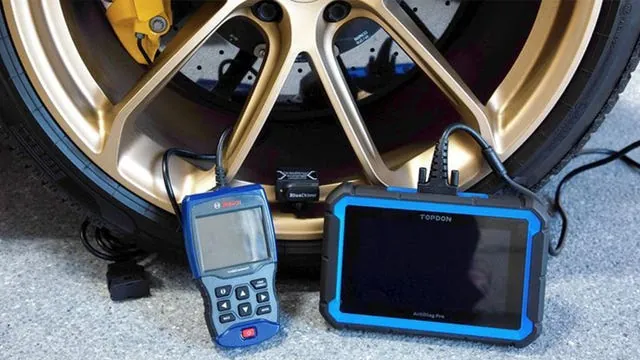 WiFi OBD2 adapter streaming data to a tablet in a car.