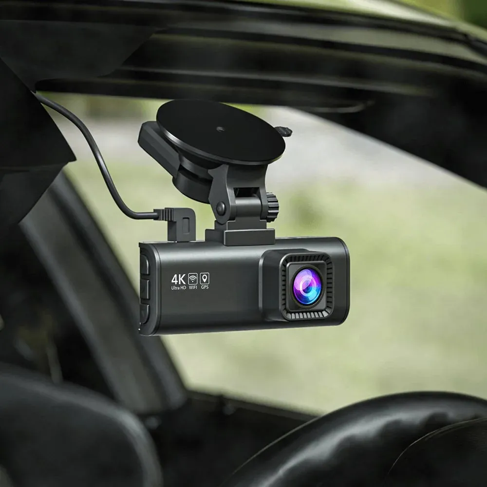Wireless backup camera cable routed along a pickup truck frame rail.
