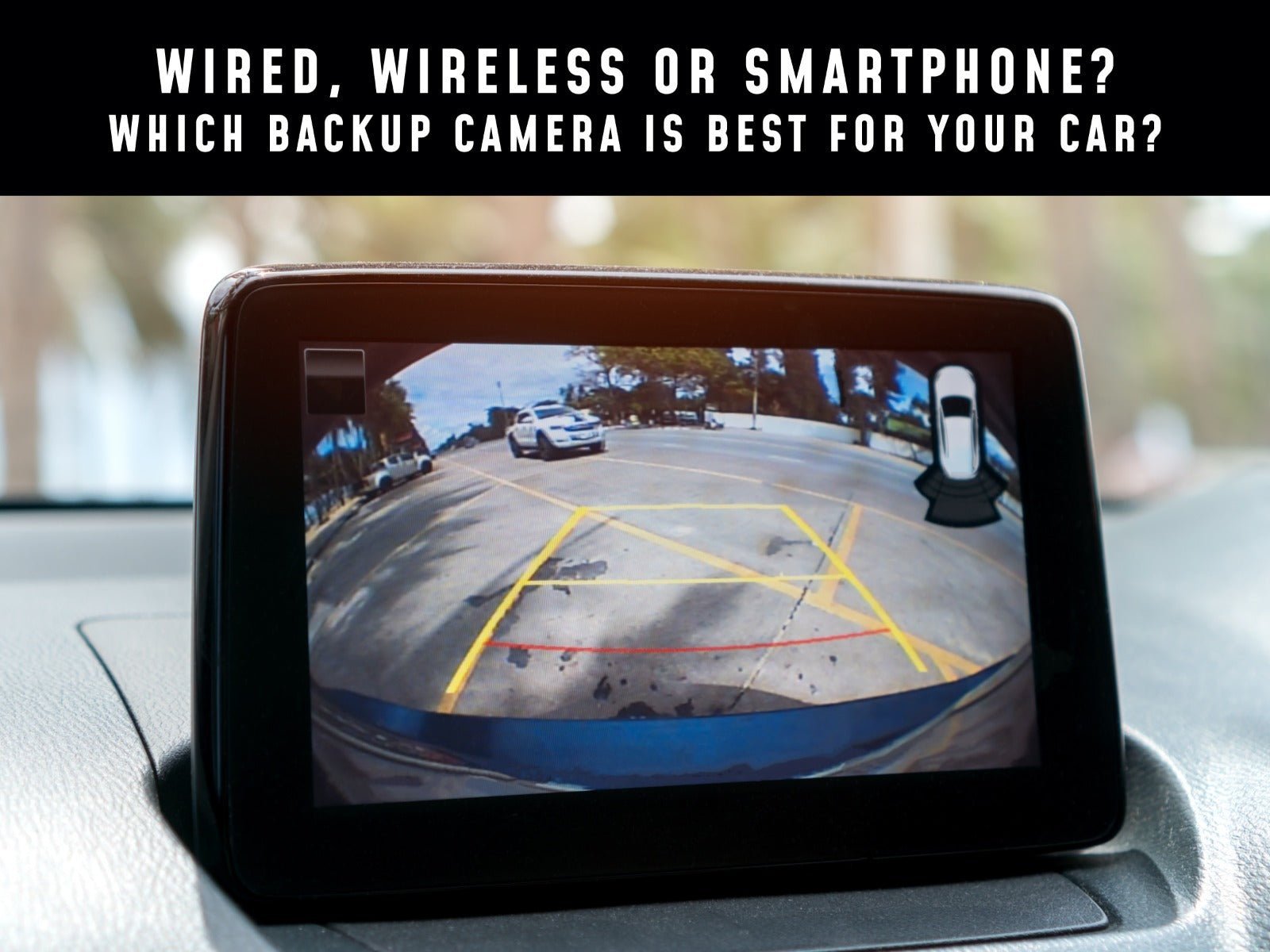 Wireless backup camera installed on a sedan parked in a sunny driveway.